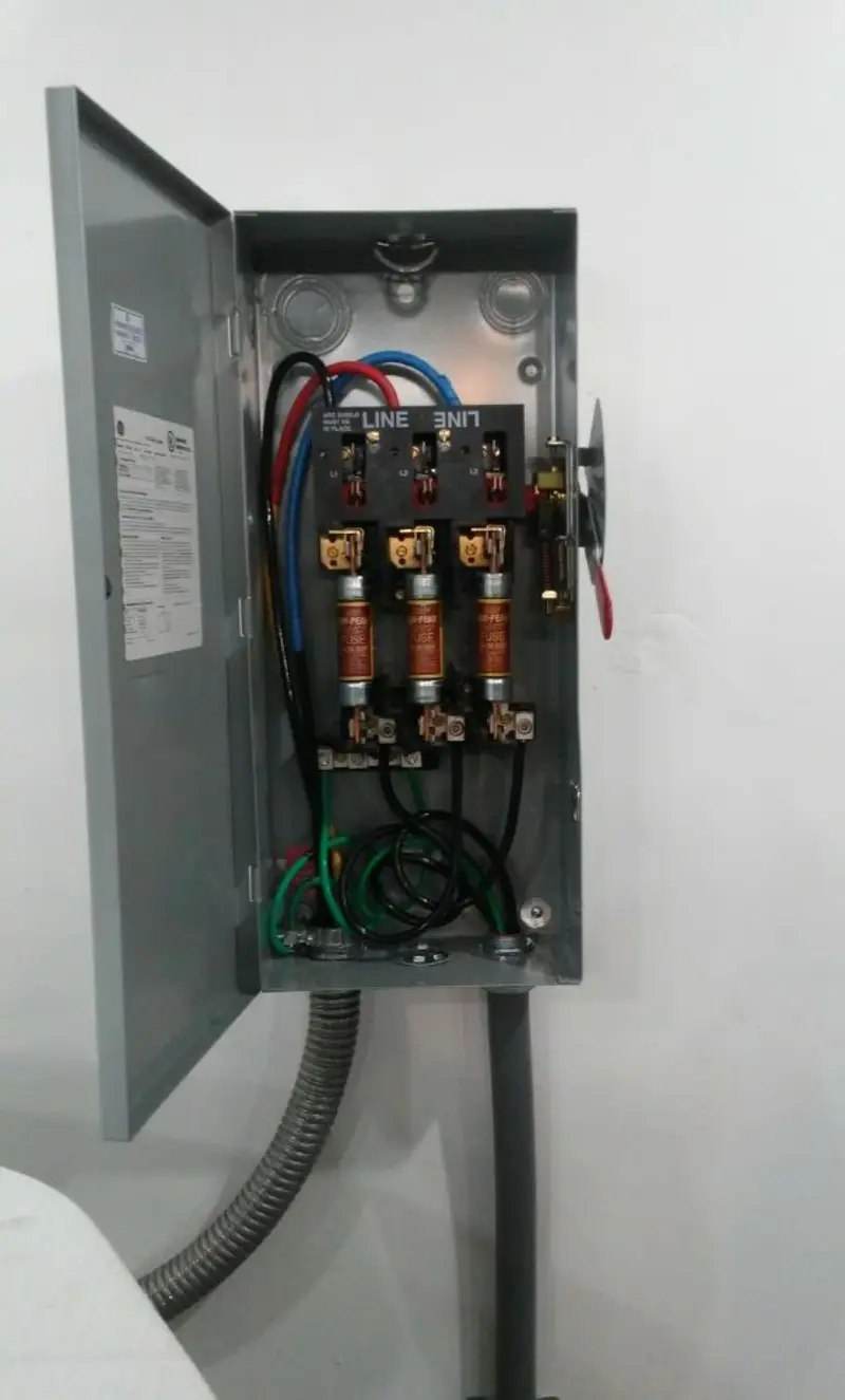 Three-phase disconnect switch installed for Smoke Detector Installation in Tioga